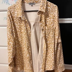 cheetah button up size S/M